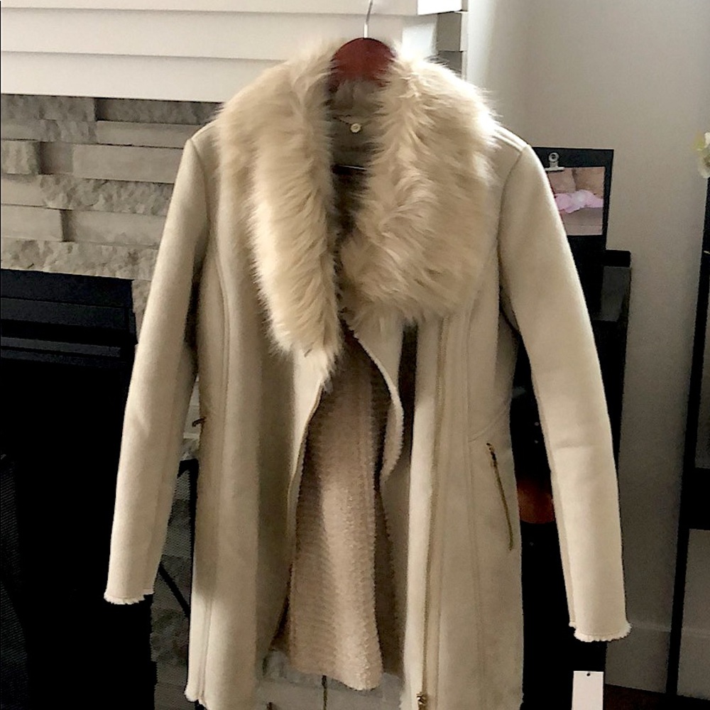 Brand new Calvin Klein suede coat. Tags still on.